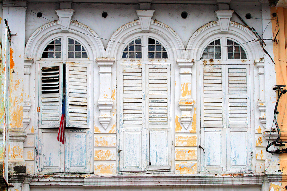 Window shutters in the charming old town disctrict of Ipoh, Malaysia (Photo by coleong / Getty Images)